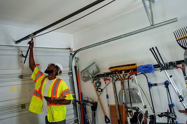 Professional Garage Door Panel Replacement technician working in West Freehold, NJ